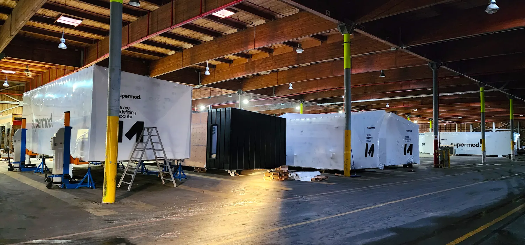 Modular production facility with modules at various stages