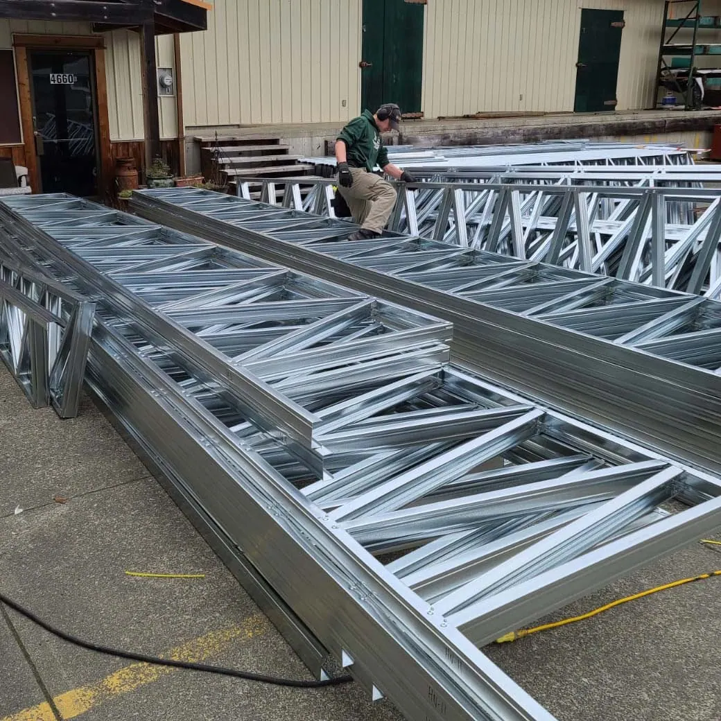 Steel trusses being assembled on the shop floor